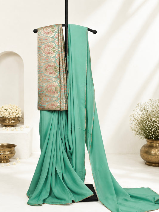 Sea green Crepe silk Saree with brocade blouse
