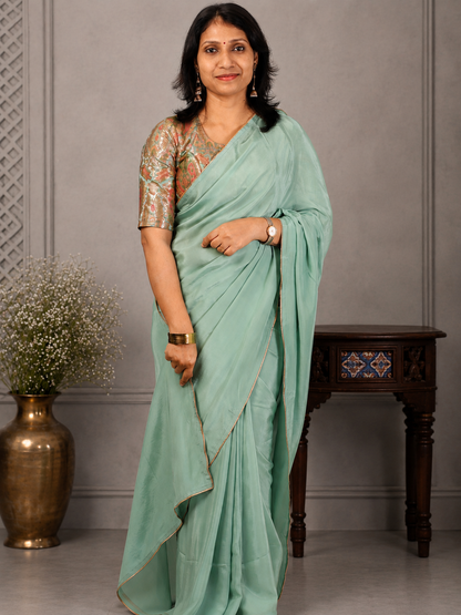 Sea green  Crepe silk Saree with brocade blouse