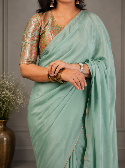 Sea green  Crepe silk Saree with brocade blouse