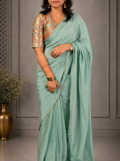 Sea green  Crepe silk Saree with brocade blouse