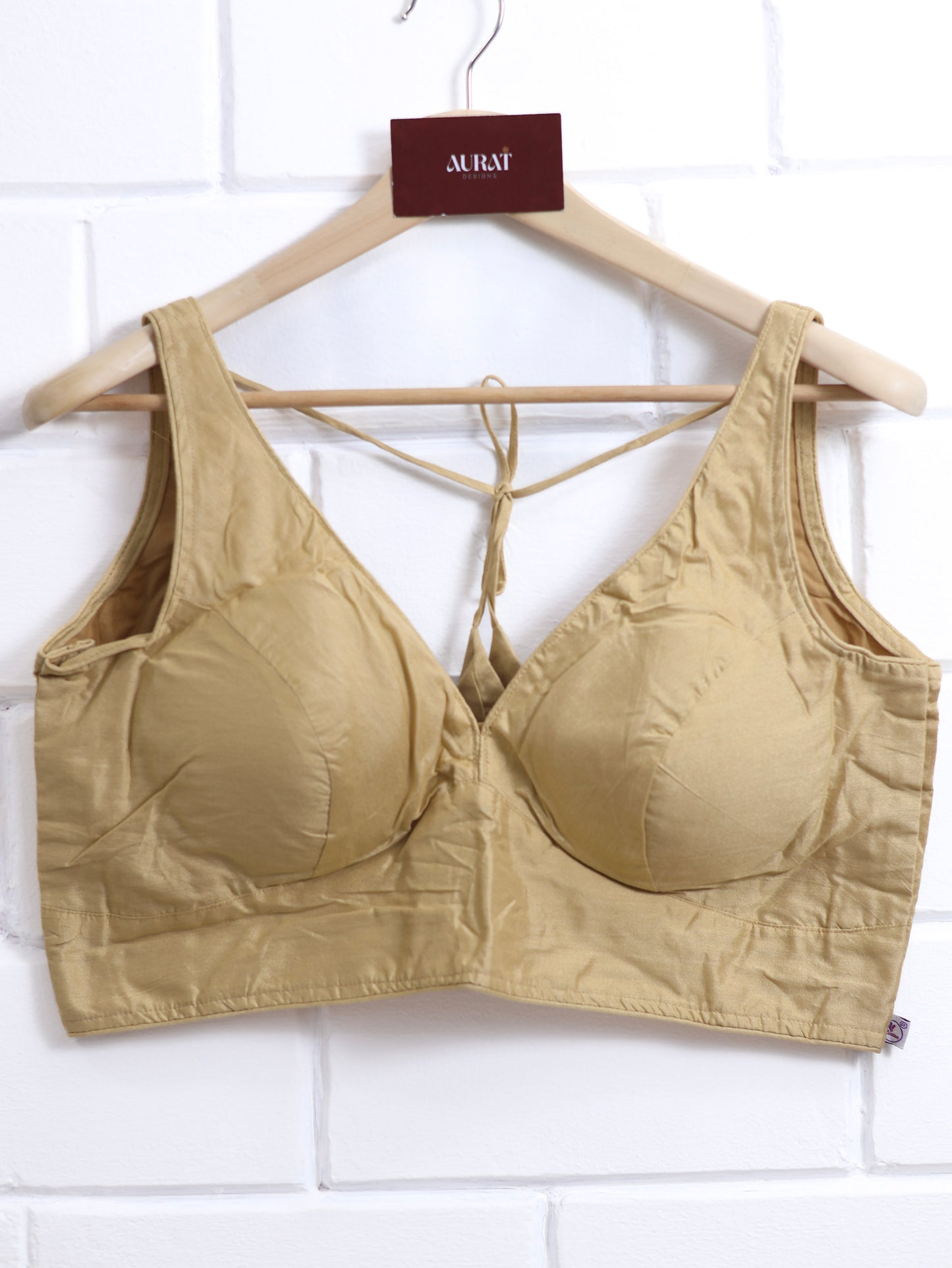 Semi silk sleeveless plain blouse for sarees - light golden- B109