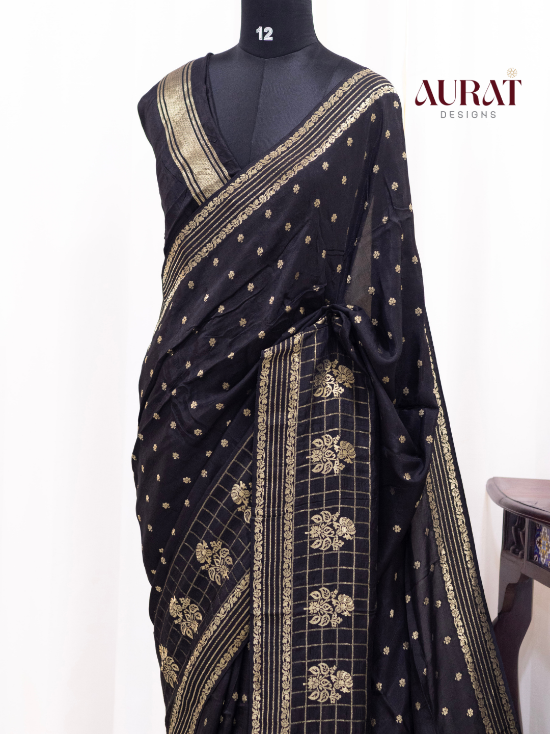 Regal Whisper – Black Dola Silk Saree with Golden Zari Bhutas