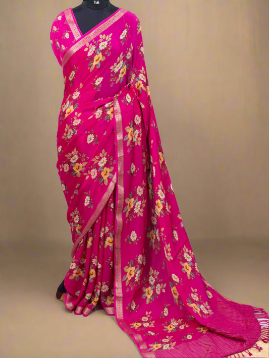 Pink saree with floral patterns on a white background, branded 'Aurat Designs'.