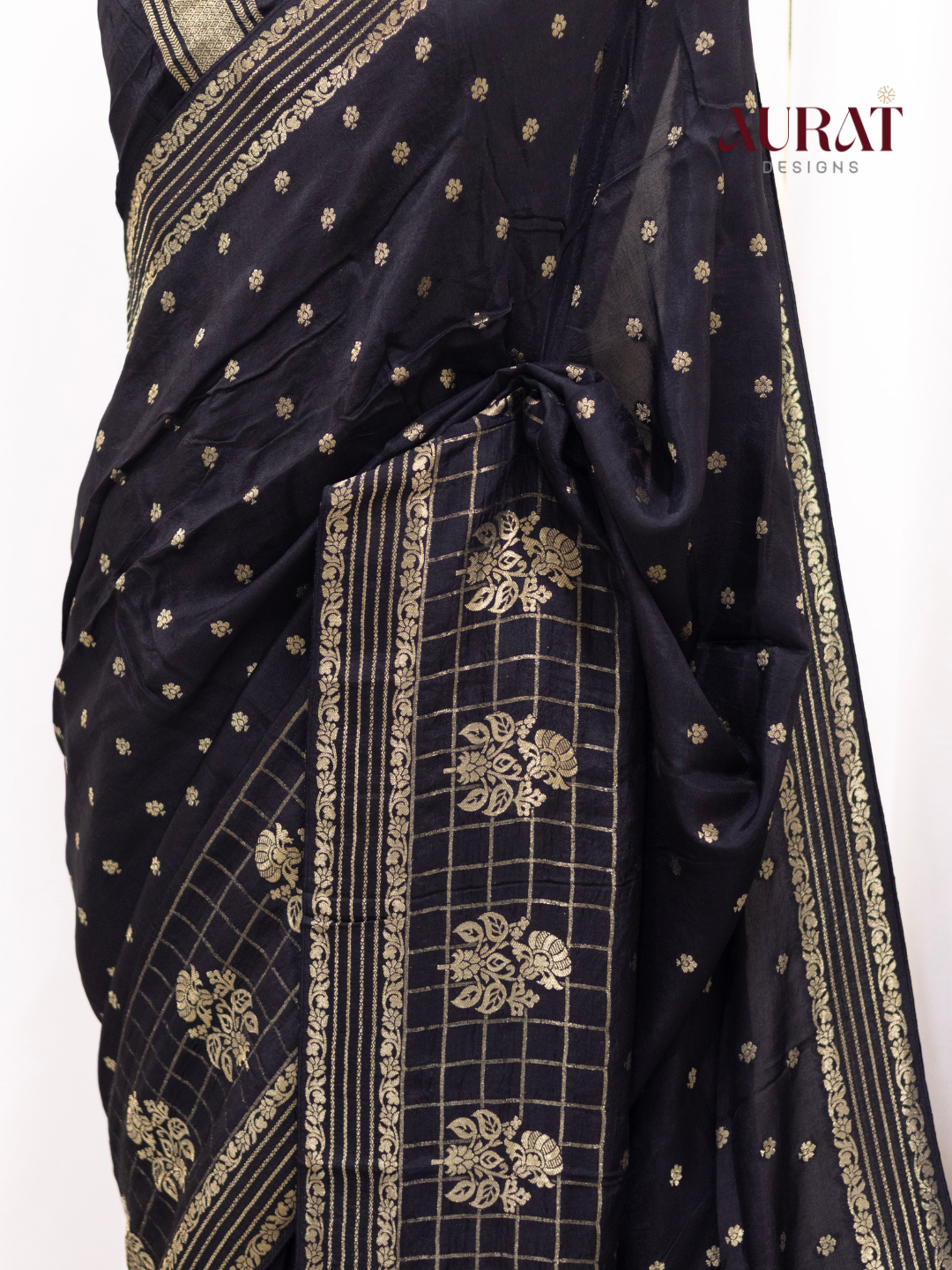 Regal Whisper – Black Dola Silk Saree with Golden Zari Bhutas